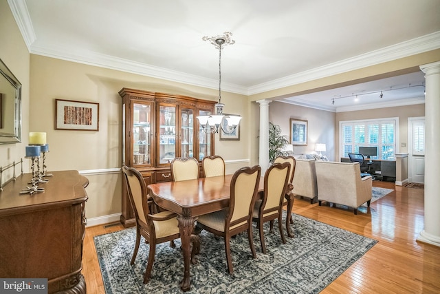 2350 Rosemont Ter, Furlong, PA 18925 - dining area with decorative columns, light wood-style floors, crown molding, a chandelier, and track lighting