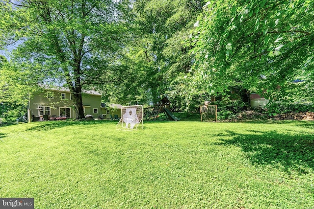 8614 Braeburn Dr, Annandale, VA 22003 - view of green lawn with a playground