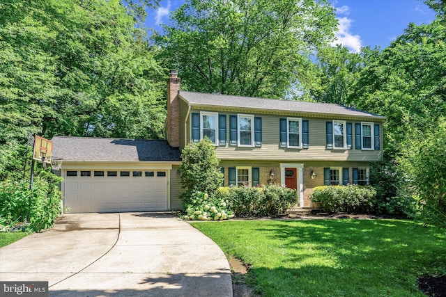 8614 Braeburn Dr, Annandale, VA 22003 - colonial house featuring a chimney, concrete driveway, a garage, and a front lawn