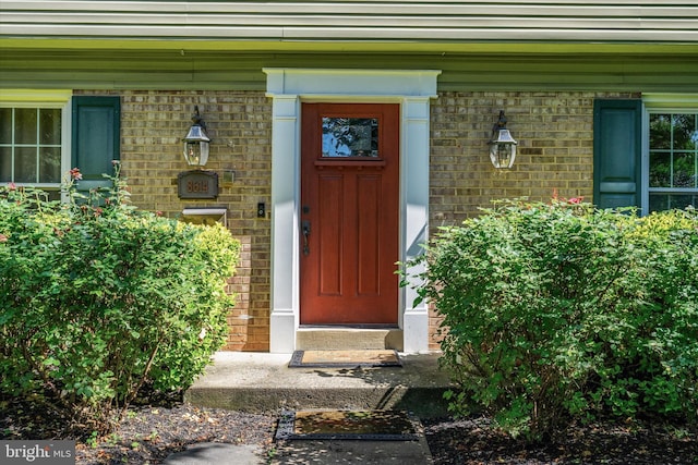 8614 Braeburn Dr, Annandale, VA 22003 - property entrance featuring a porch and brick siding