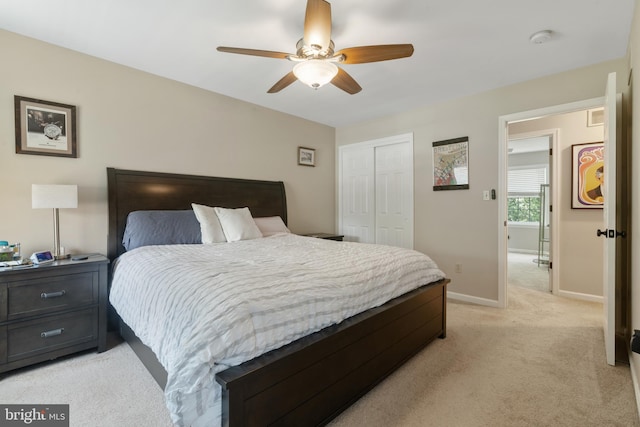 154 S Main St, Dublin, PA 18917 - bedroom with light colored carpet, a closet, and a ceiling fan