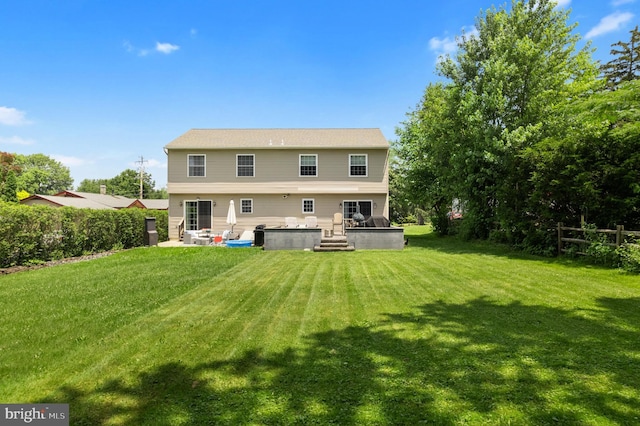 154 S Main St, Dublin, PA 18917 - rear view of property featuring a lawn and a deck