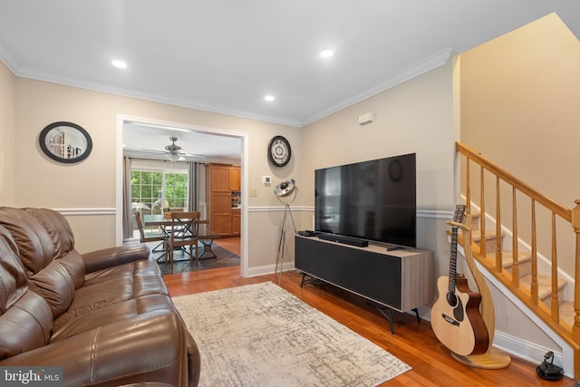 154 S Main St, Dublin, PA 18917 - living area with ornamental molding, a ceiling fan, stairway, wood finished floors, and recessed lighting