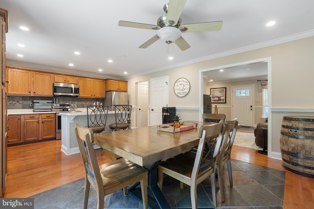 154 S Main St, Dublin, PA 18917 - dining room featuring recessed lighting, crown molding, a ceiling fan, and dark wood-style floors