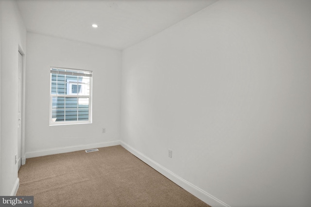 2305 James St, Baltimore, MD 21230 - spare room with light colored carpet and recessed lighting