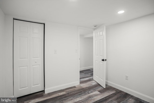 2305 James St, Baltimore, MD 21230 - unfurnished bedroom featuring recessed lighting, dark wood-type flooring, and a closet