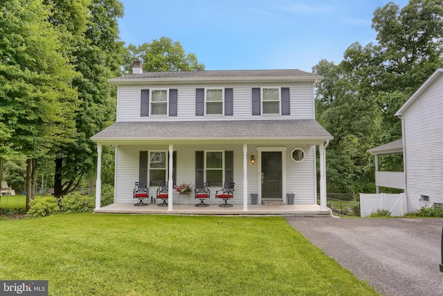 937 Meadow Ln, Millersburg, PA 17061 - view of front facade featuring covered porch, a chimney, and roof with shingles