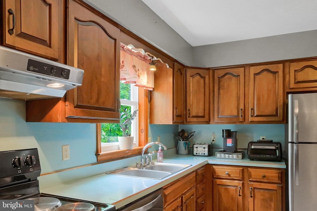 937 Meadow Ln, Millersburg, PA 17061 - kitchen featuring appliances with stainless steel finishes, range hood, brown cabinets, and light countertops