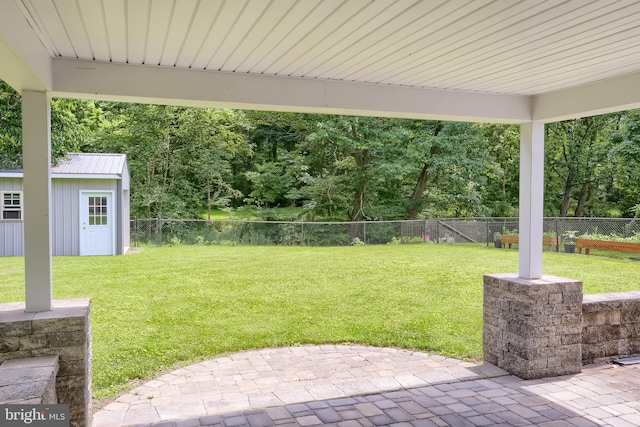 937 Meadow Ln, Millersburg, PA 17061 - fenced backyard featuring a patio area, an outdoor structure, and view of scattered trees