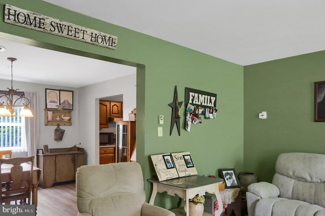937 Meadow Ln, Millersburg, PA 17061 - living area with light wood-style floors and a chandelier