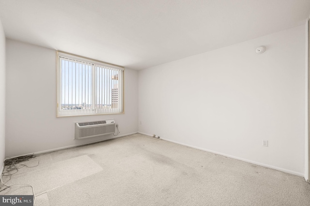1901 John F Kennedy Blvd Unit 2923, Philadelphia, PA 19103 - carpeted empty room with a wall mounted air conditioner and a smoke detector