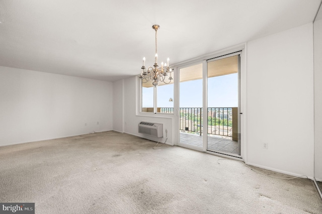 1901 John F Kennedy Blvd Unit 2923, Philadelphia, PA 19103 - unfurnished living room with a chandelier, carpet, and a wall mounted air conditioner