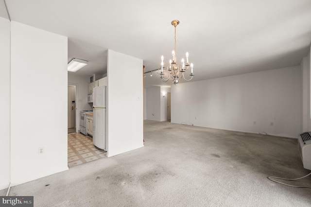 1901 John F Kennedy Blvd Unit 2923, Philadelphia, PA 19103 - unfurnished living room featuring a chandelier and light carpet
