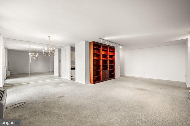 1901 John F Kennedy Blvd Unit 2923, Philadelphia, PA 19103 - unfurnished room featuring track lighting, carpet flooring, and a chandelier