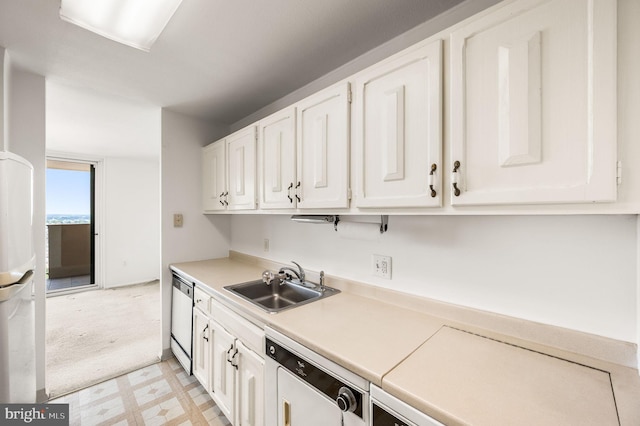 1901 John F Kennedy Blvd Unit 2923, Philadelphia, PA 19103 - kitchen featuring white appliances, light flooring, white cabinets, and light countertops