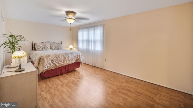 12502 Kilbourne Ln, Bowie, MD 20715 - bedroom featuring light wood finished floors and a ceiling fan