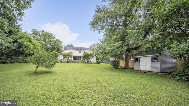 12502 Kilbourne Ln, Bowie, MD 20715 - view of grassy yard featuring a storage shed