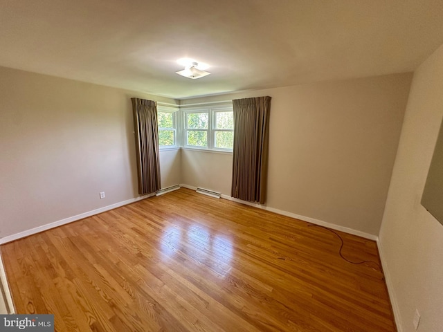2475 Wharton Rd, York, PA 17402 - spare room with light wood-style flooring and baseboards