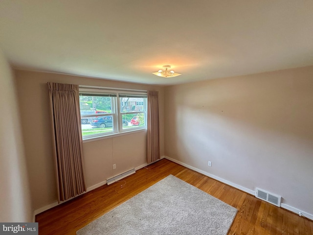 2475 Wharton Rd, York, PA 17402 - spare room with baseboard heating and wood finished floors