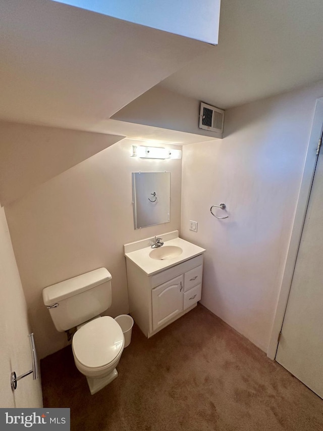 2475 Wharton Rd, York, PA 17402 - half bathroom featuring toilet and vanity
