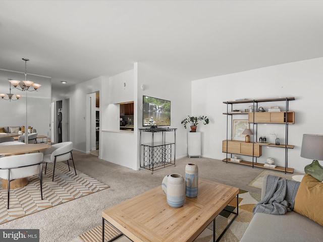 200 Erin Way Unit 204, Reisterstown, MD 21136 - living area featuring light carpet and a chandelier
