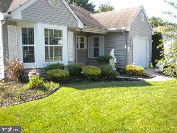 114 Danbury Dr, Little Egg Harbor Twp, NJ 08087 - ranch-style home featuring a garage and a front yard