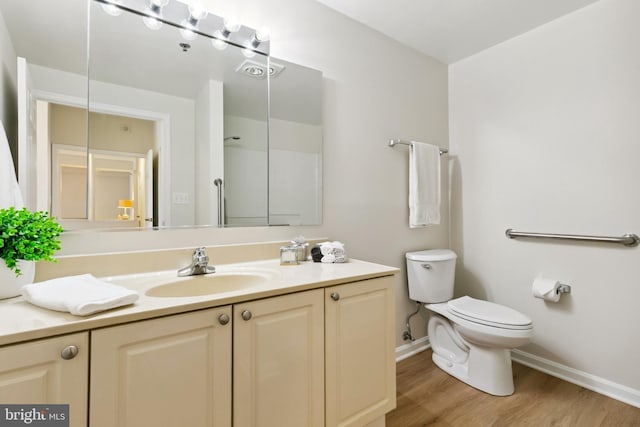 3005 S Leisure World Blvd Unit 226, Silver Spring, MD 20906 - full bath with wood finished floors, vanity, and a shower
