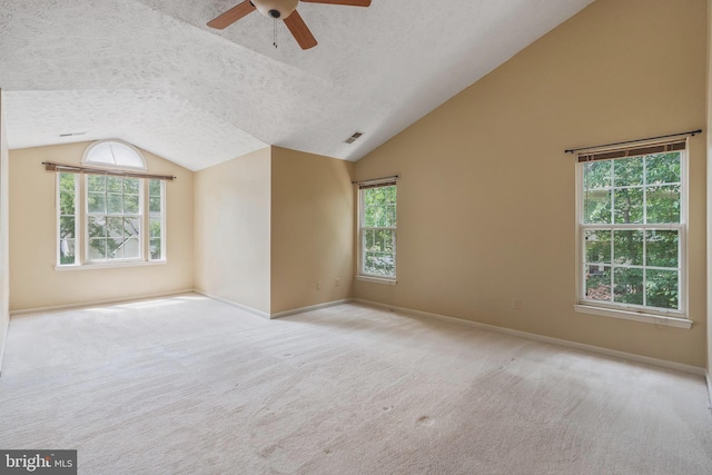 16715 Tintagel Ct, Dumfries, VA 22025 - unfurnished room with vaulted ceiling, a textured ceiling, ceiling fan, healthy amount of natural light, and carpet floors