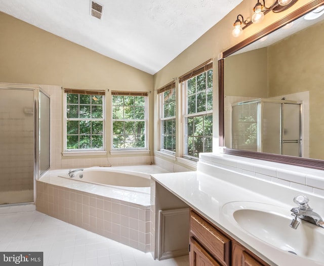 16715 Tintagel Ct, Dumfries, VA 22025 - bathroom with tile patterned floors, a stall shower, vanity, lofted ceiling, and a garden tub