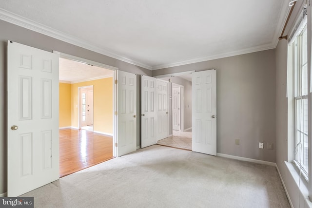 16715 Tintagel Ct, Dumfries, VA 22025 - unfurnished bedroom with light colored carpet and crown molding