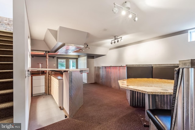 16715 Tintagel Ct, Dumfries, VA 22025 - interior space featuring bar, rail lighting, light colored carpet, and multiple windows