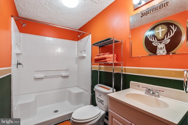 16715 Tintagel Ct, Dumfries, VA 22025 - bathroom with a textured ceiling, a shower, and vanity
