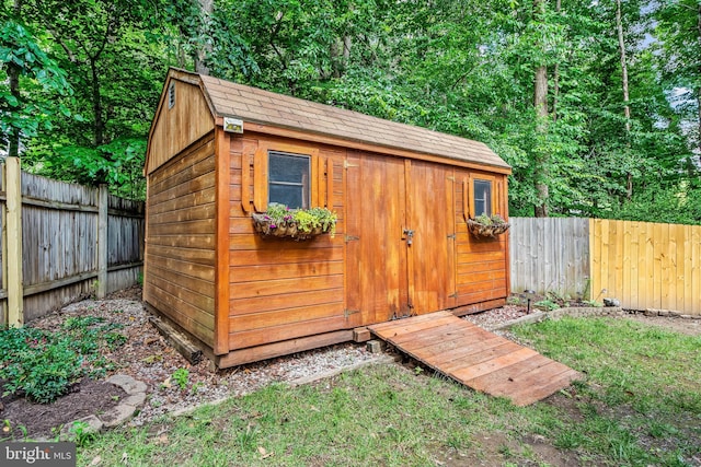 16715 Tintagel Ct, Dumfries, VA 22025 - view of outdoor structure with a fenced backyard