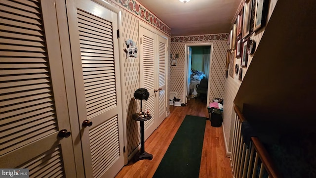 59 Singer Rd, New Freedom, PA 17349 - corridor featuring wallpapered walls and wood finished floors