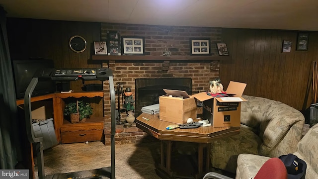 59 Singer Rd, New Freedom, PA 17349 - living area with a brick fireplace, carpet flooring, and wooden walls