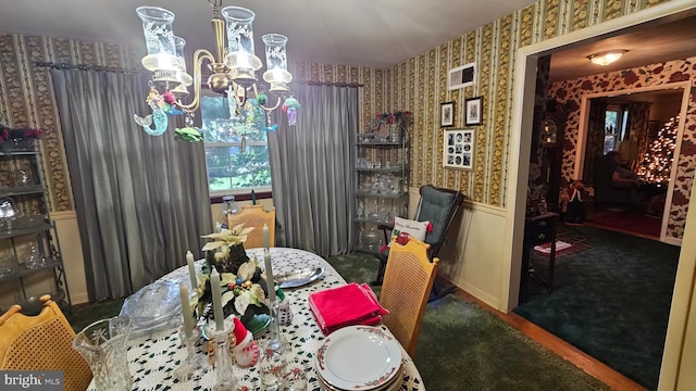 59 Singer Rd, New Freedom, PA 17349 - dining area featuring wallpapered walls, a chandelier, and a wainscoted wall