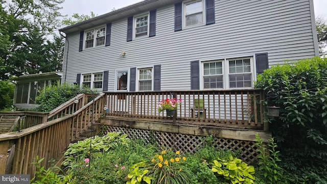 59 Singer Rd, New Freedom, PA 17349 - rear view of house with a deck and a sunroom