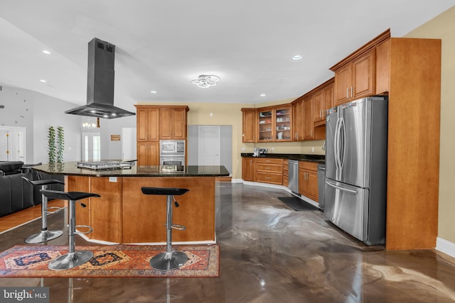 13716 Molly Berry Rd, Brandywine, MD 20613 - kitchen featuring stainless steel appliances, island exhaust hood, brown cabinets, a kitchen breakfast bar, and glass insert cabinets