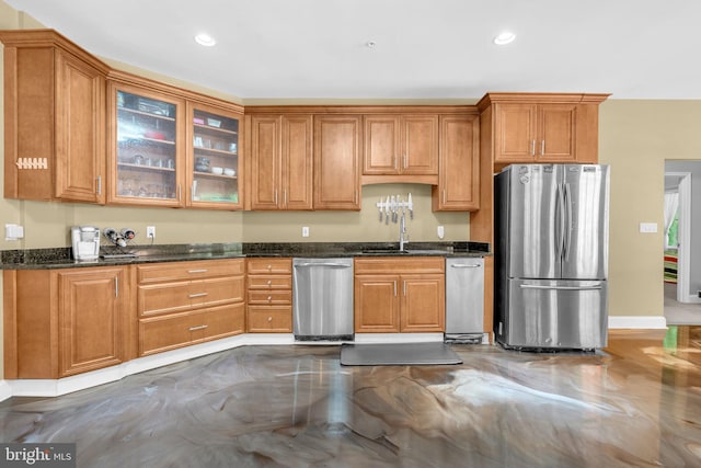 13716 Molly Berry Rd, Brandywine, MD 20613 - kitchen with stainless steel appliances, glass insert cabinets, dark stone counters, recessed lighting, and brown cabinets