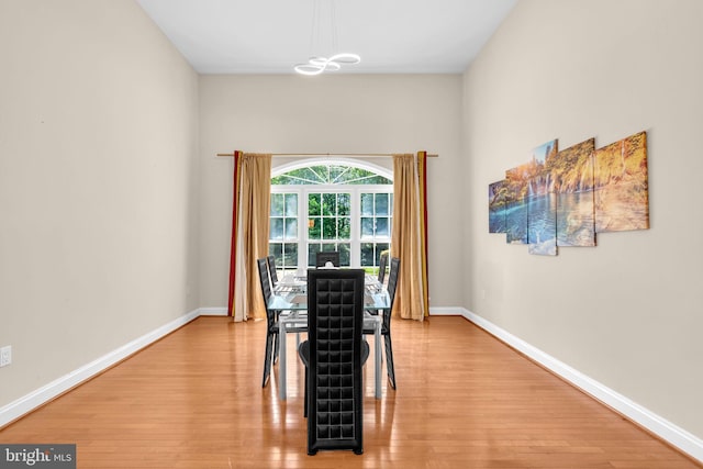 13716 Molly Berry Rd, Brandywine, MD 20613 - dining room featuring light wood-type flooring and a chandelier