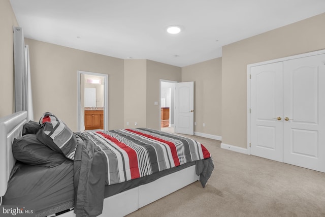 13716 Molly Berry Rd, Brandywine, MD 20613 - bedroom featuring light colored carpet, a closet, and ensuite bathroom