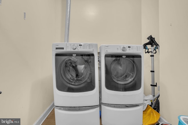 13716 Molly Berry Rd, Brandywine, MD 20613 - laundry room featuring independent washer and dryer and baseboards