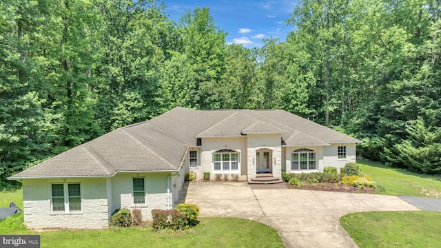 13716 Molly Berry Rd, Brandywine, MD 20613 - view of front facade featuring a front lawn, brick siding, stone siding, and concrete driveway