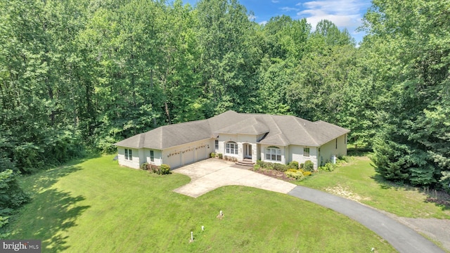 13716 Molly Berry Rd, Brandywine, MD 20613 - view of front of home featuring an attached garage, driveway, a front lawn, roof with shingles, and a wooded view