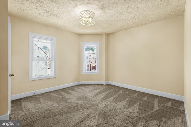 2929 N W St, Wilmington, DE 19802 - carpeted spare room with a textured ceiling and baseboards