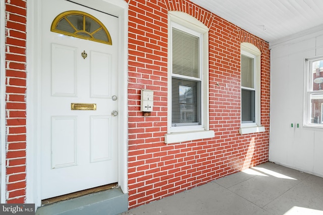 2929 N W St, Wilmington, DE 19802 - view of exterior entry featuring a porch and brick siding