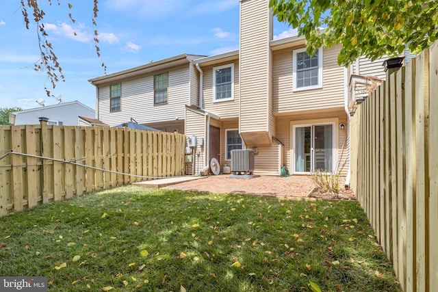 14983 Cheyenne Way, Haymarket, VA 20169 - rear view of property with a fenced backyard, a chimney, and a patio area