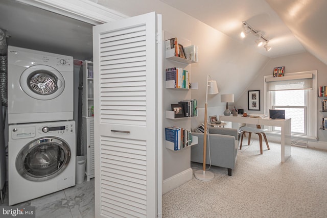 151 N Union St Unit 6, Lambertville, NJ 08530 - laundry room featuring stacked washer and clothes dryer, an office area, and rail lighting