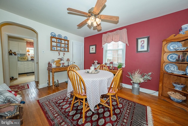 127 Long Rd, King Of Prussia, PA 19406 - dining area featuring arched walkways, wood-type flooring, and a ceiling fan