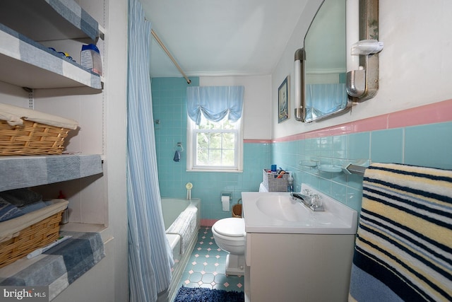 127 Long Rd, King Of Prussia, PA 19406 - bathroom with vanity, shower / bath combo with shower curtain, tile walls, and wainscoting